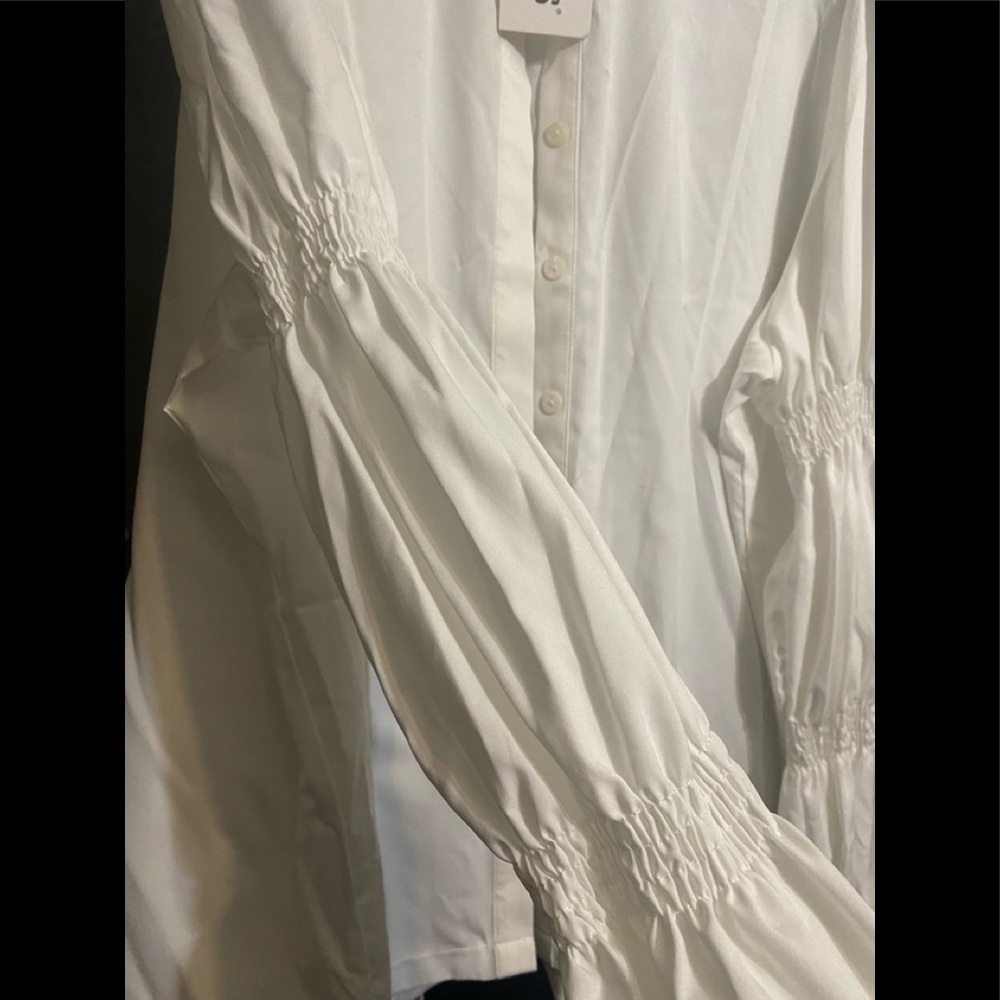 Crisp white button down with a modern puff sleeve